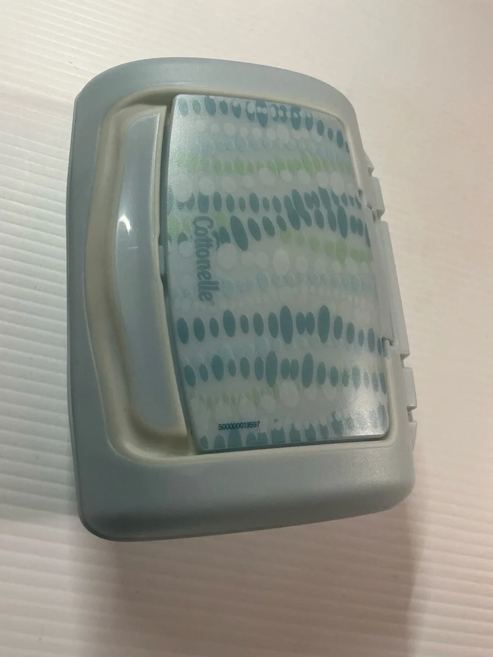 Cottonelle Mostly Colored Blue w/ Green with Word Logo Print Top Pop-Up Dispense